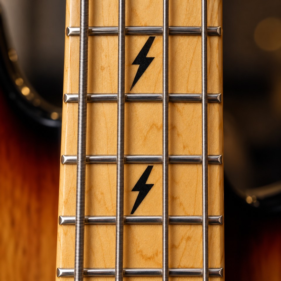 Maple fretboard with Lightning inlays